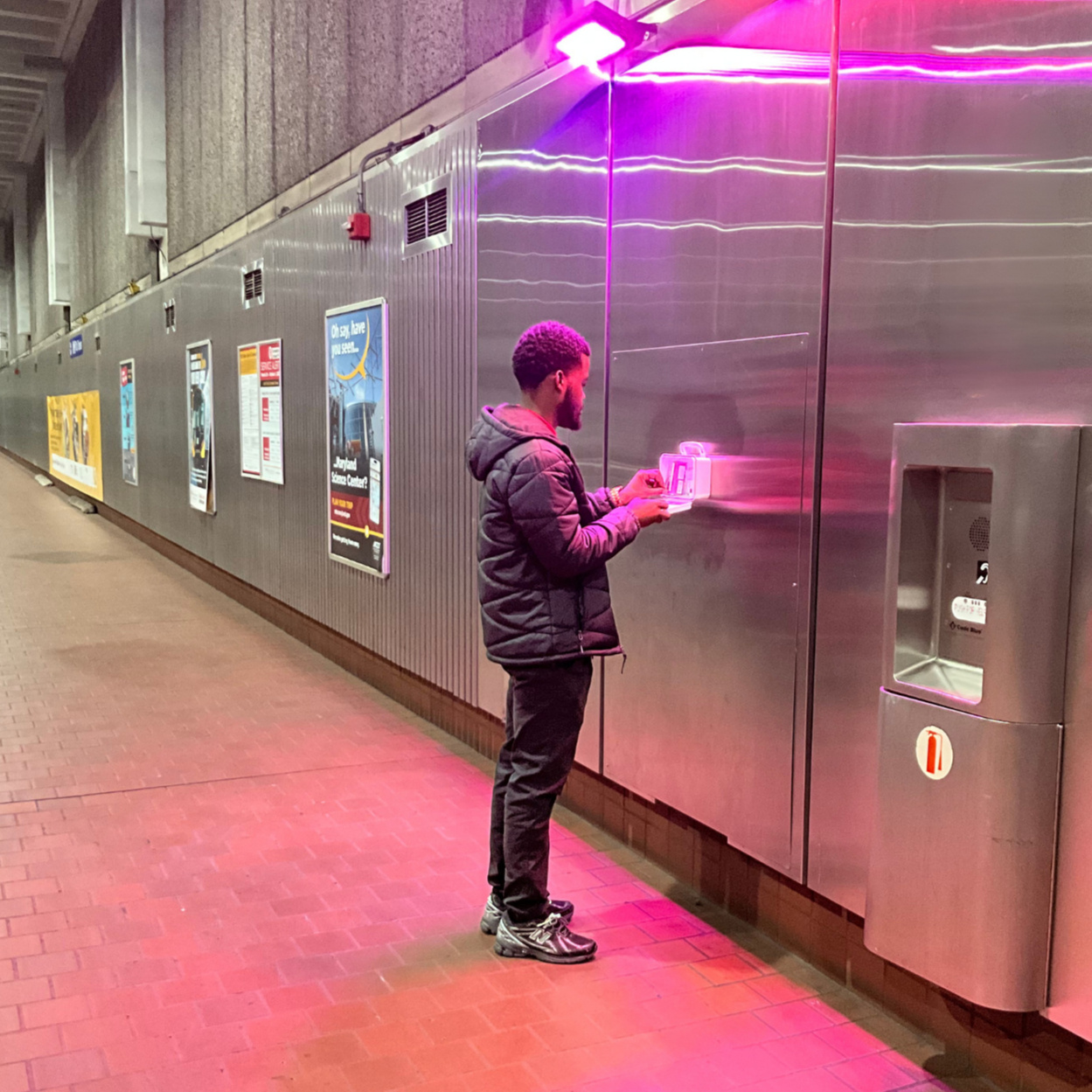 Untitled Sean Craig (CPRS), Installing ONEbox at Upton Subway Station.